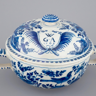 A dated Dutch Delft blue and white round bowl with cover for spiced wine, ca. 1709