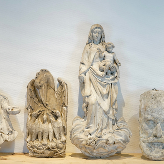 Five various plaster casts including a pelican and a bearded man's face, 19/20th C., Bruges