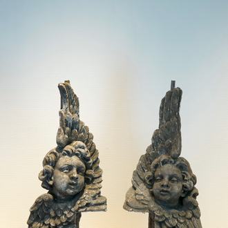 A set of two plaster casts of winged cherubs en pendant, 19/20th C., Bruges