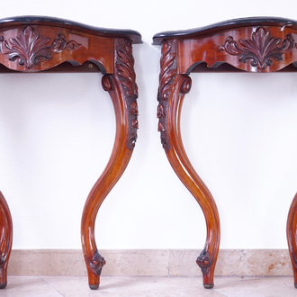 A fine pair of carved wood wall console tables, 19th C.