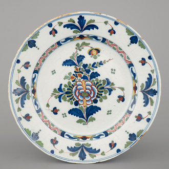 A polychrome English Delftware dish, London, 18th C.