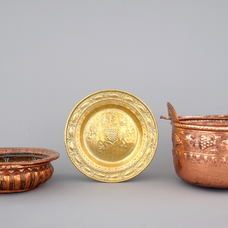 A Flemish brass alms dish, an Italian brass basin and a French brass kettle, all 17th C.