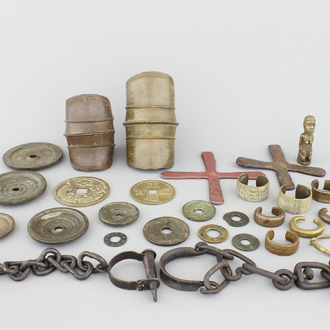A selection of African bronze bracelets, coins, chains and other items, 19/20th C.