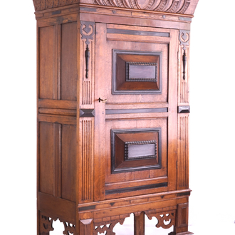 A neo renaissance one door oak cabinet, 19th C.