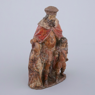 A carved and painted wood group of "Saint-Nicholas and the children", 17/18th C.
