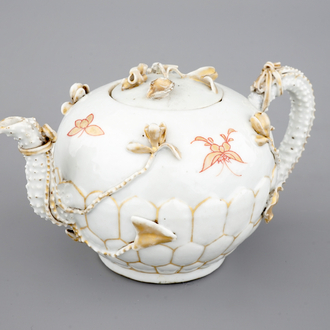 A Chinese relief-decorated gilt tea pot, Yongzheng, 18th C.