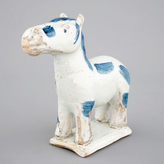 A blue and white Chinese porcelain figure of a horse for the Dutch market, 18th C.