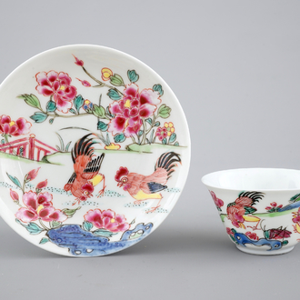 A Chinese famille rose porcelain cup and saucer with cocks, Yongzheng, 1722-1735