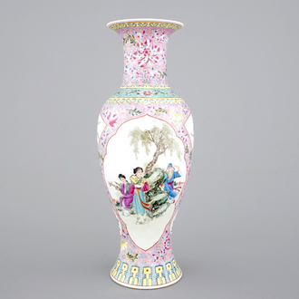 A Chinese porcelain famille rose vase with ladies in a garden, 20th C