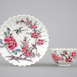 A Chinese famille rose porcelain cup and saucer with birds among flowers, 18th C.