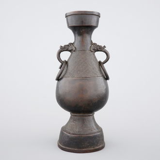 A Chinese bronze elongated bottle-shaped vase, Ming Dynasty