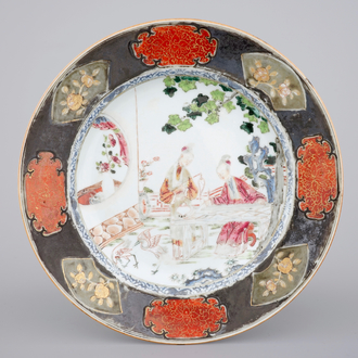 A Chinese famille rose porcelain plate with ladies in a garden, Yongzheng, 1722-1735
