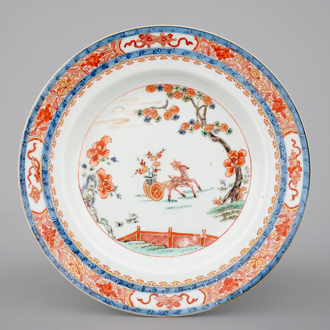 A fine Chinese verte-imari plate with a deer in a garden, Kangxi/Yongzheng, early 18th C.