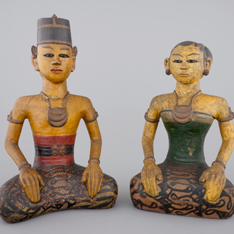 Two tall Indonesian cold-painted pottery figures of servants, 19th C.