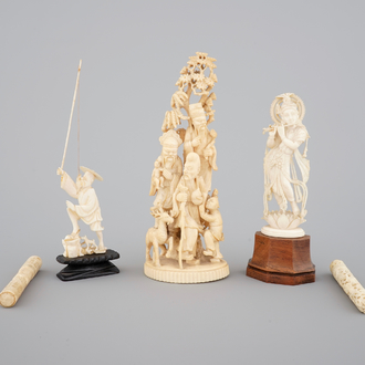 A carved Chinese ivory group of 3 Immortals, a fisherman and two needle cases, with an Indian carved ivory goddess, 19th C.