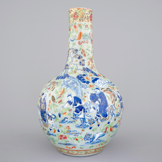 A Chinese celadon-ground blue and white porcelain bottle-shaped vase with Cantonese overdecoration, 19th C.