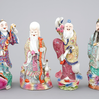 A set of four Chinese famille rose porcelain figures, 19th C.