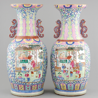 A massive pair of Chinese relief-decorated famille rose porcelain vases, 19th C.