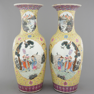 A massive pair of Chinese famille jaune and rose vases with elephants, early 19th C.