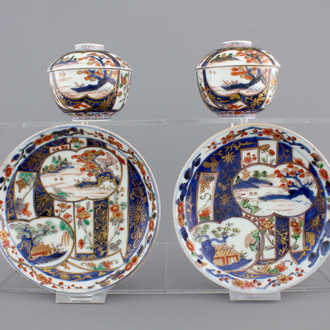 A pair of Japanese Imari porcelain cups and covers on stand, 18th C.
