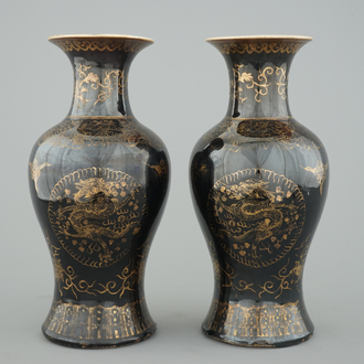 A pair of Chinese gilt-decorated mirror black vases, 18/19th C.