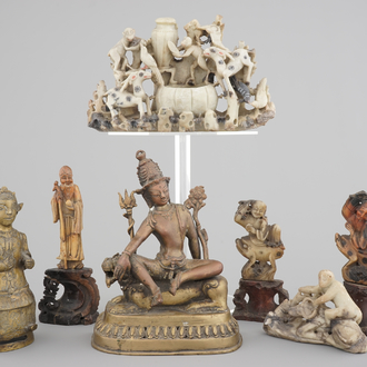 Two Chinese or Tibetan bronze figures, one of Tara seated on a tiger and a set of soapstone carvings, 18/19th C.