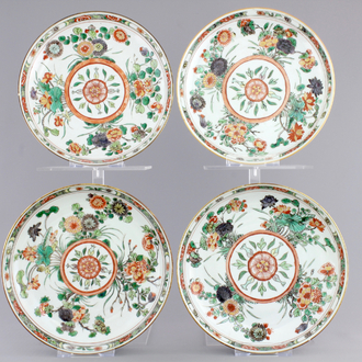 A set of four Chinese famille verte porcelain plates with flowers, Kangxi, ca. 1700