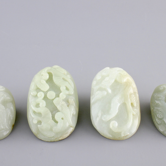 A set of 4 pale celadon jade carvings, 19/20th C.