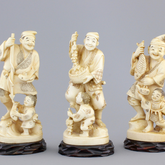Three Japanese ivory carved okimono of fishermen with their son, Meiji, 19th C.