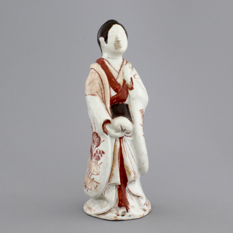 A Japanese porcelain figure of a male official, 17/18th C.