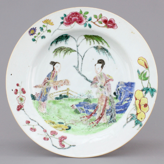 A Chinese famillle rose porcelain plate with ladies in a garden with a qin, Yongzheng, 1722-1735