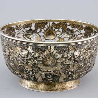 An open-worked Chinese silver dragon bowl, Wang Hing, China, 19th C.