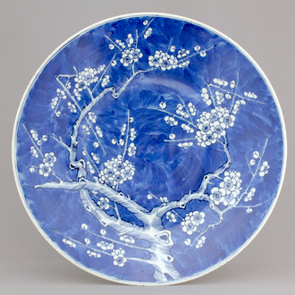A Chinese porcelain dish with prunus blossoms, 19th C