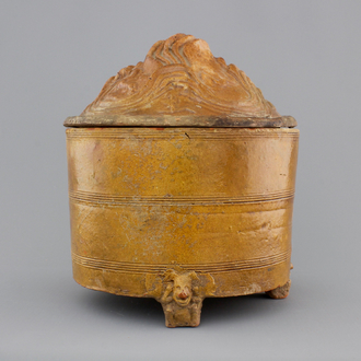 A brown-glazed pottery tripod vessel and mountain cover, Han Dynasty (206 BC-220 AC)