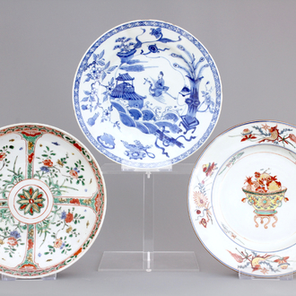 A lot of 3 Chinese porcelain plates: famille verte, blue and white and verte-imari, 18th C.