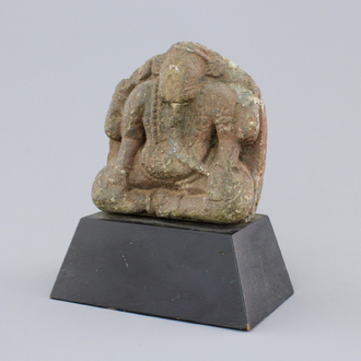 A carved stone figure of Ganesha, possibly Khmer, 12th C.