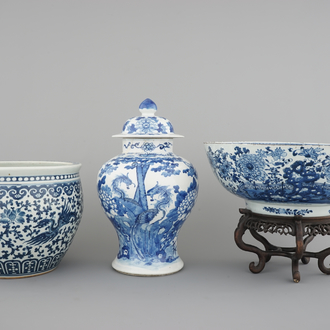 Blue and white Chinese porcelain: A large Qianlong punchbowl, a fish bowl and a vase with cover, 19th C.