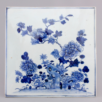 A large rectangular blue and white tile with floral decoration, Qianlong, 18th C.