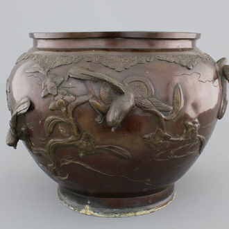A Japanese bronze relief-decorated jardiniere, 19th C.