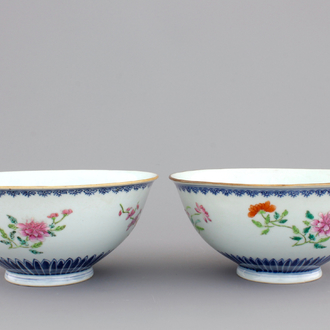 A fine pair of Chinese famille rose floral bowls, Qianlong seal mark and prob. of the period, 18th C.