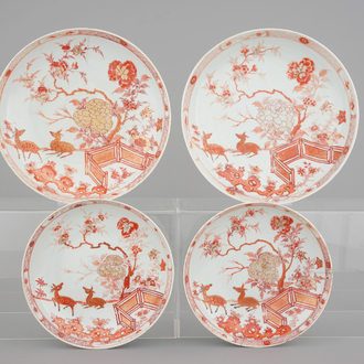 Two pairs of Chinese iron-red and gilt plates with deers in a garden, Yongzheng-Qianlong, 18th C.