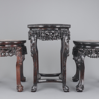 Three carved Chinese wood marble top vase stands, 19/20th C.