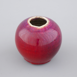 A Chinese flambe-glazed porcelain ink jar, 19th C.