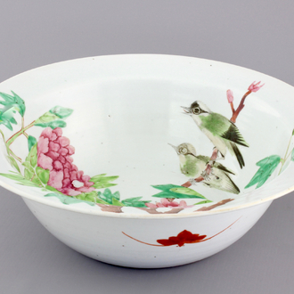 A Chinese porcelain famille rose basin with birds on a branch, 19th C.
