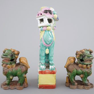 Three Chinese porcelain polychrome foo dogs, the verte biscuit pair, 18th, the other 19th C.