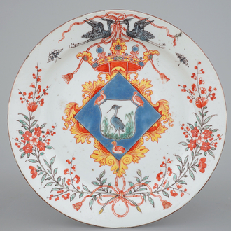 A fine Dutch-decorated armorial blanc de Chine plate, 18th C.