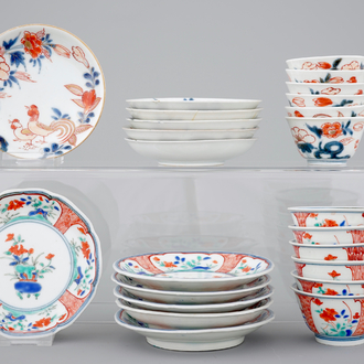 Twelve Japanese porcelain cups and saucers, Imari and Kakiemon, 18th C.