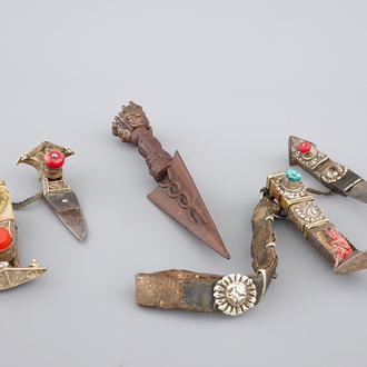 A Tibetan iron Purbu, 13/14th C. and two knives in silver and semi-precious stones, 19/20th C.