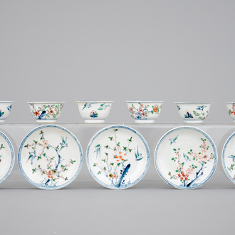 A set of six Chinese famille verte cups and five saucers, Kangxi, 18th C.