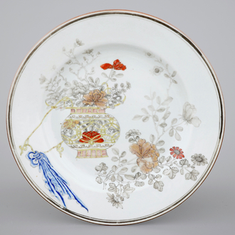 A fine Chinese grisaille and gilt flower basket plate, early 18th C.
